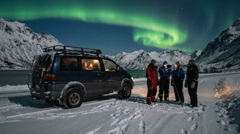 Off-road minivan and travellers in thermal suits under the aurora on a small-group Tromso aurora borealis tour, northern Norway
